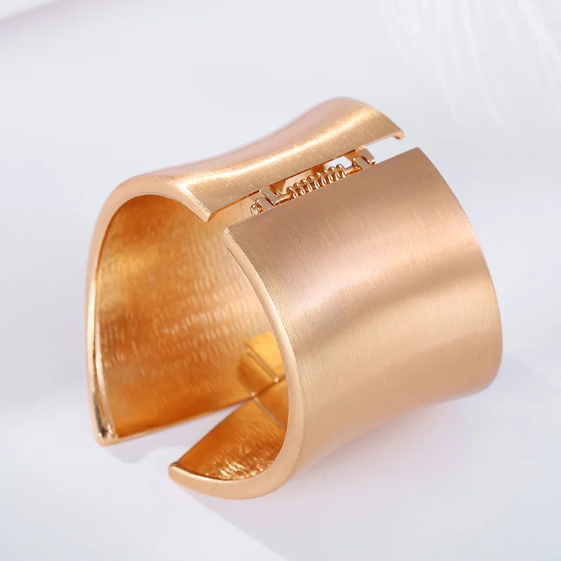 Hip-Hop Inspired Wide Asymmetric Gold-Colored Bangle for Women